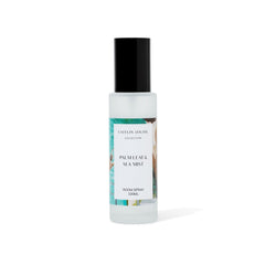 Room spray bottle with a label on a white background