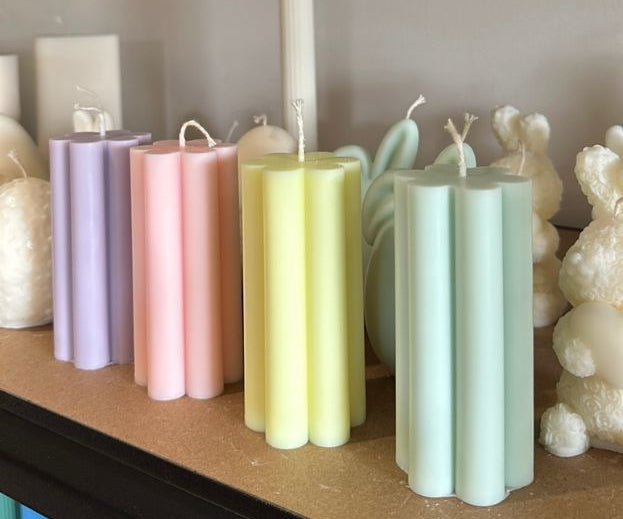 Blossom pillar candles - pastel colours on shelf