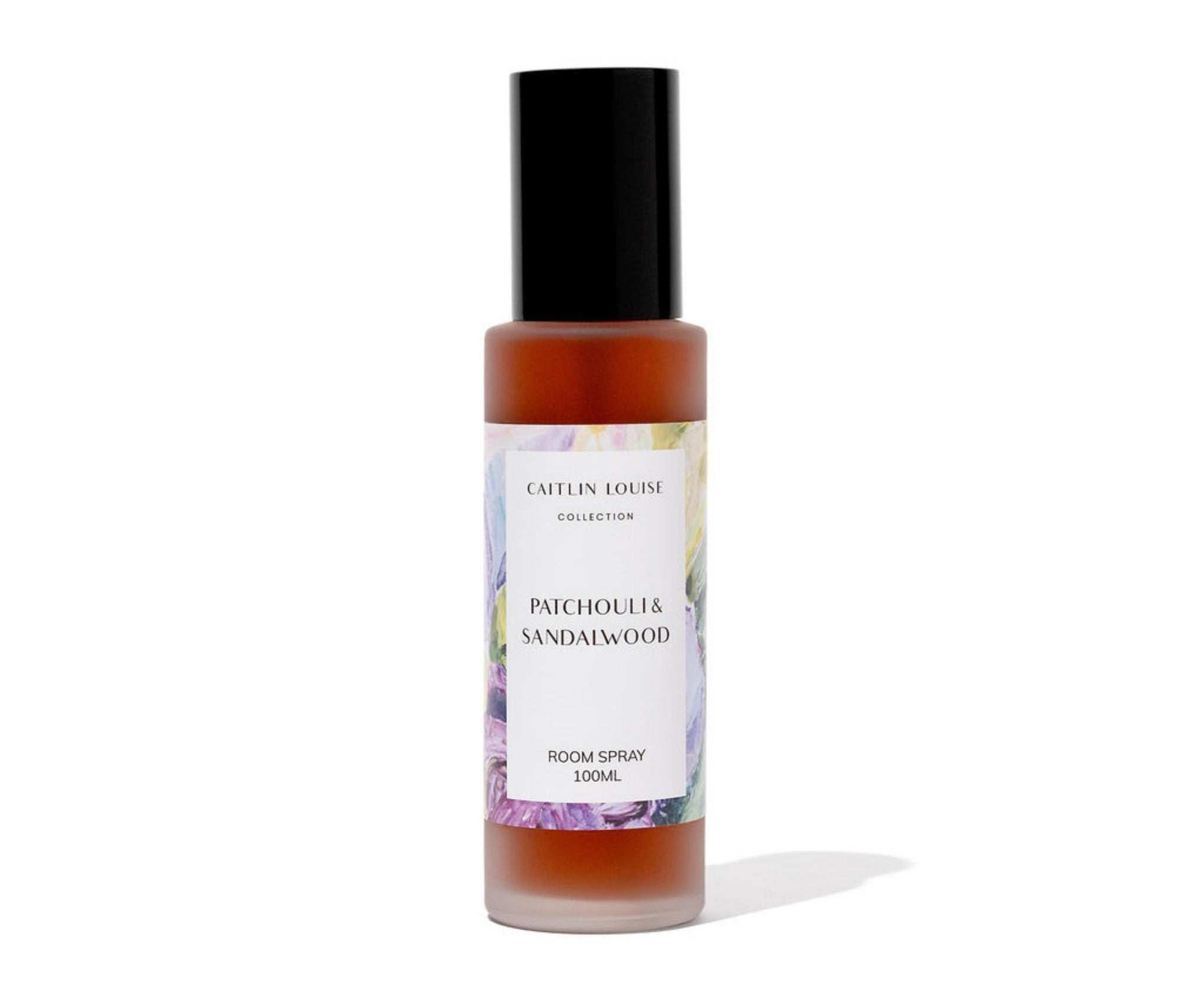 Room spray bottle with a label on a white background