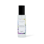 Patchouli and Sandalwood Room spray bottle with a label on a white background
