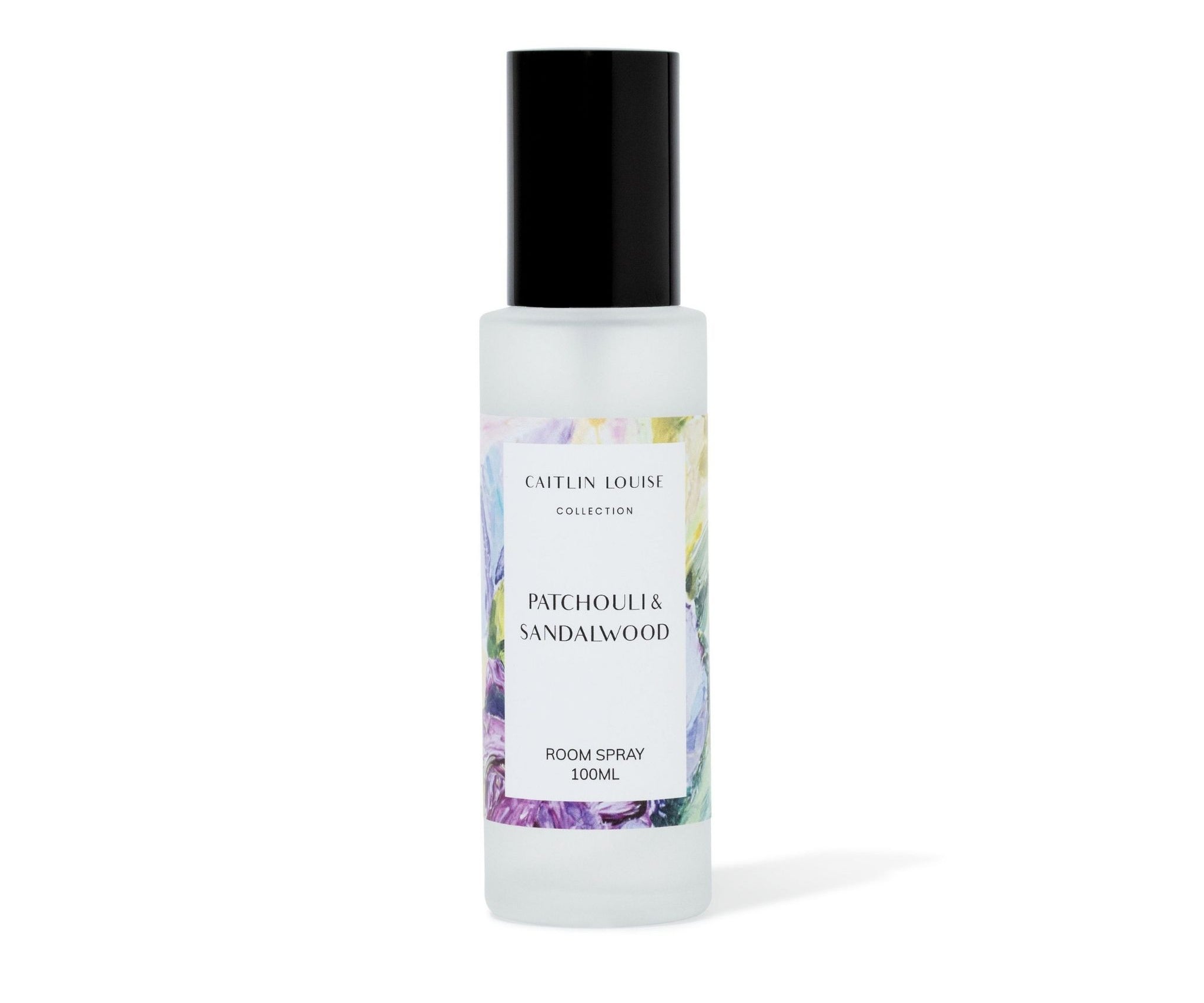 Patchouli and Sandalwood Room spray bottle with a label on a white background
