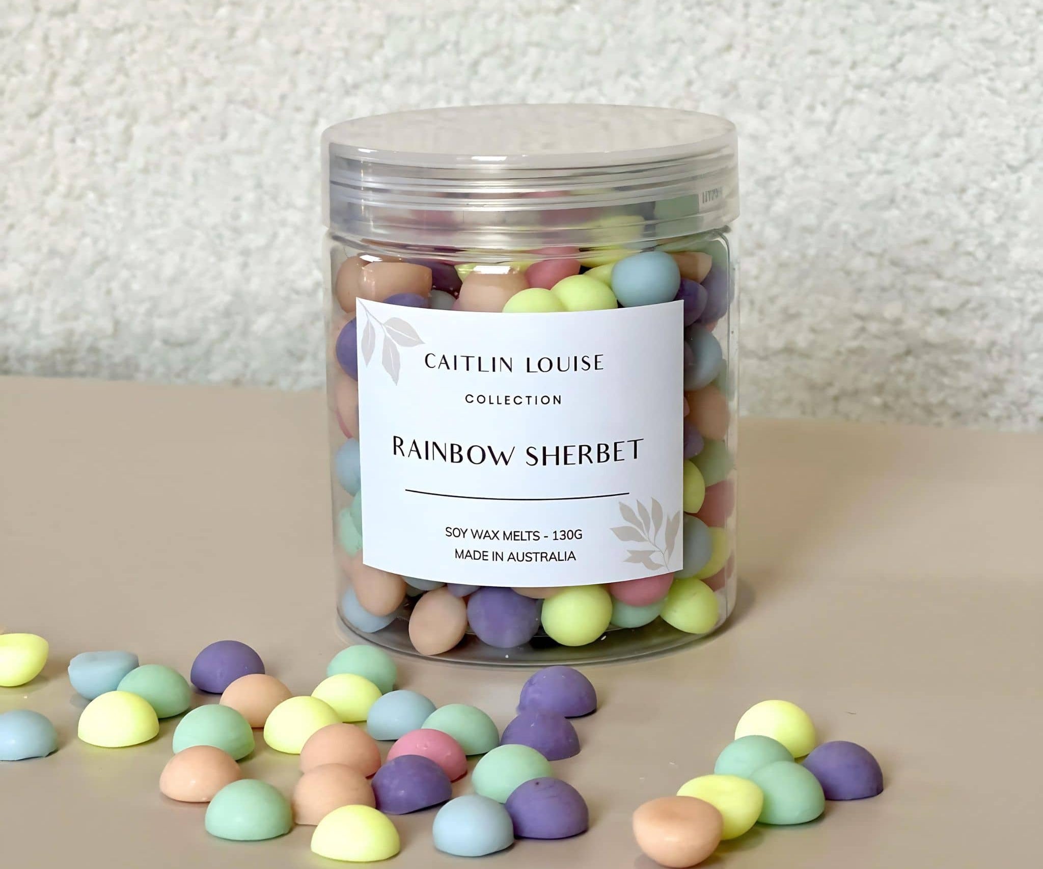 Caitlin Louise Collection's Rainbow Sherbet Soy Wax Melt Pebbles - white background - tan base