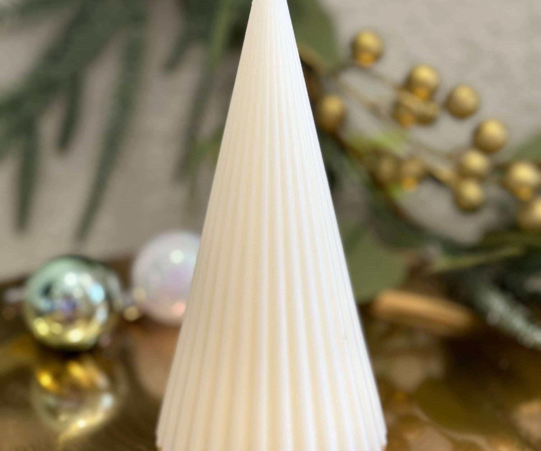 Caitlin Louise Collection's Ribbed Cone Christmas Tree sculptural candle - on gold tray