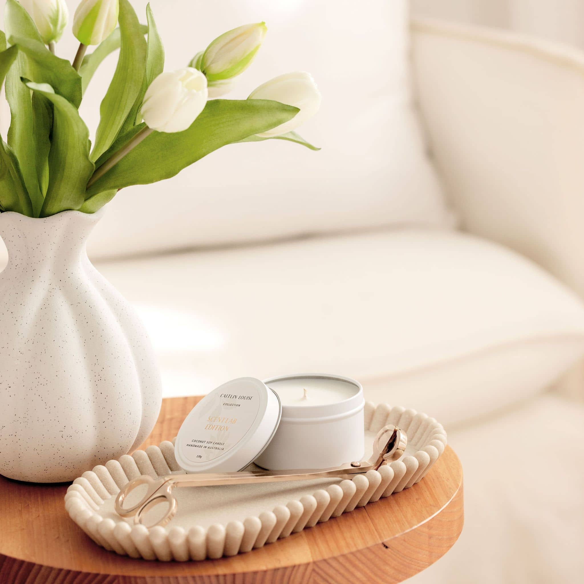 Scent Lab Edition candle on tray - styled in lounge room