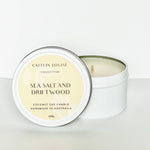 Sea salt and driftwood travel tin candle - white background