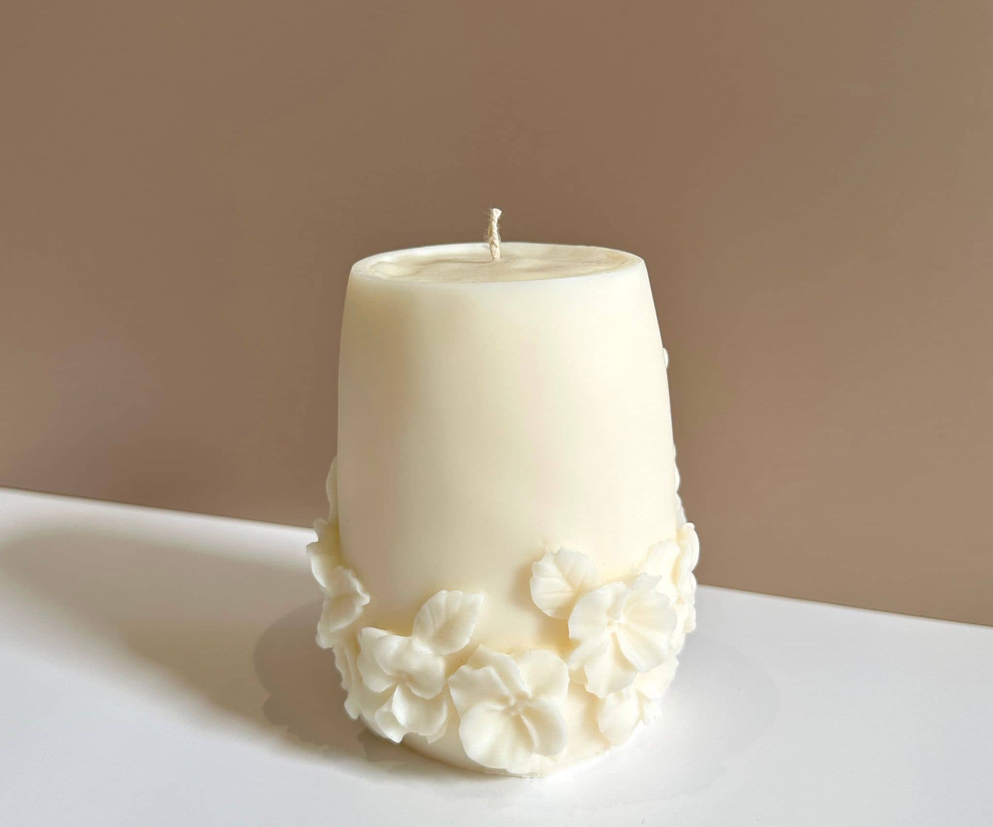 Caitlin Louise Collection's Seraphina sculptural candle alternate view - brown background