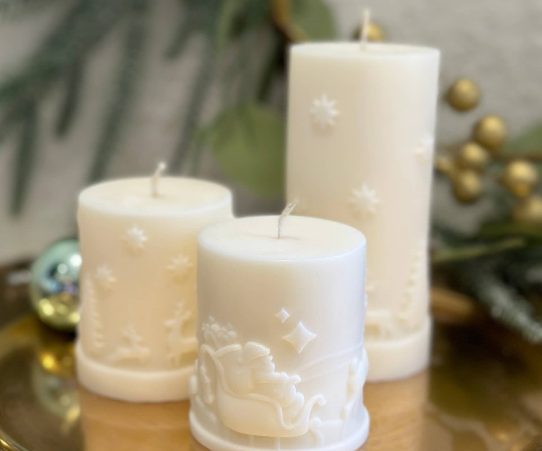 Caitlin Louise Collection trio of Christmas Pillar Candles - large and small - on gold tray