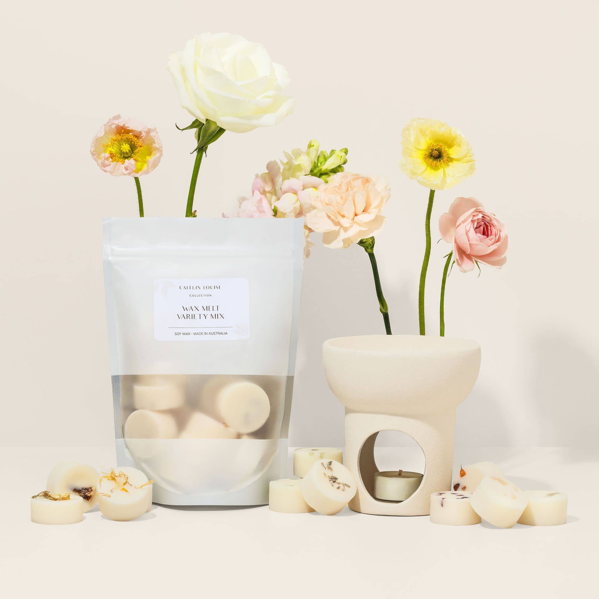 Wax melt variety pack - styled with wax melter and flowers - beige background