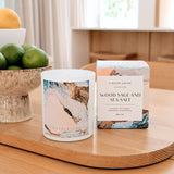 Caitlin Louise Collection Wood Sage and Sea Salt Annie Everingham Artist Candle - styled on dining table