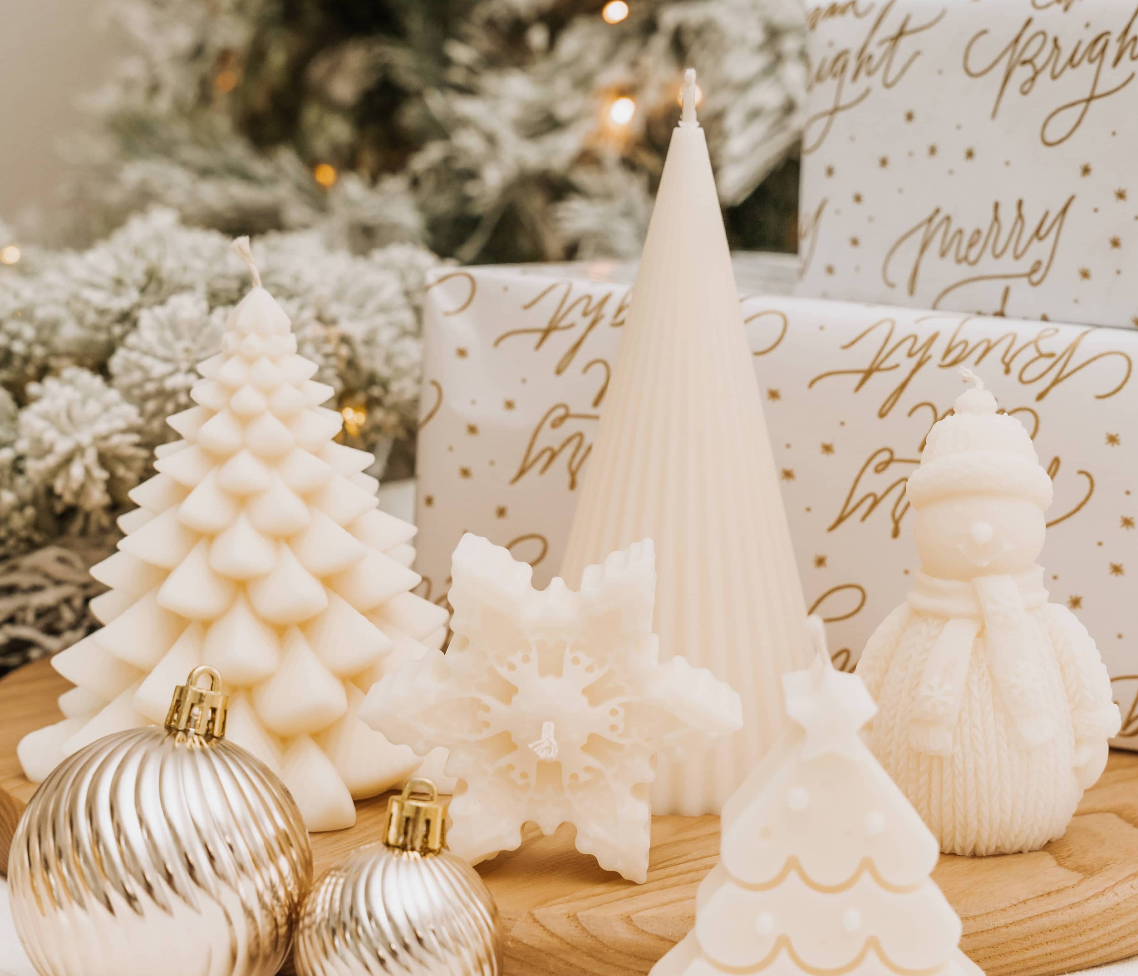 Caitlin Louise Collection's christmas decorative sculptural candles - styled with christmas tree background