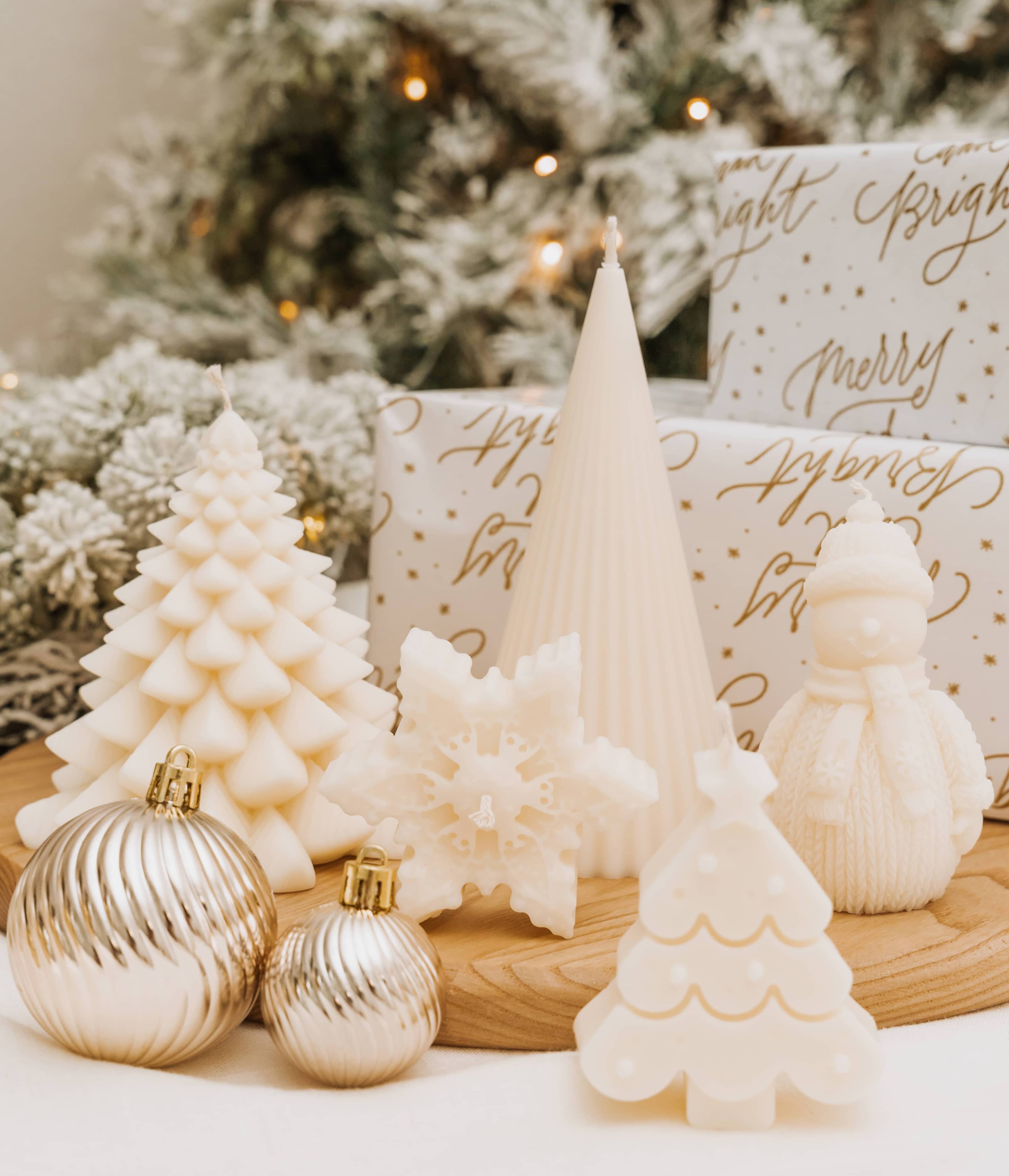 Caitlin Louise Collection's christmas decorative sculptural candles - styled with christmas tree background